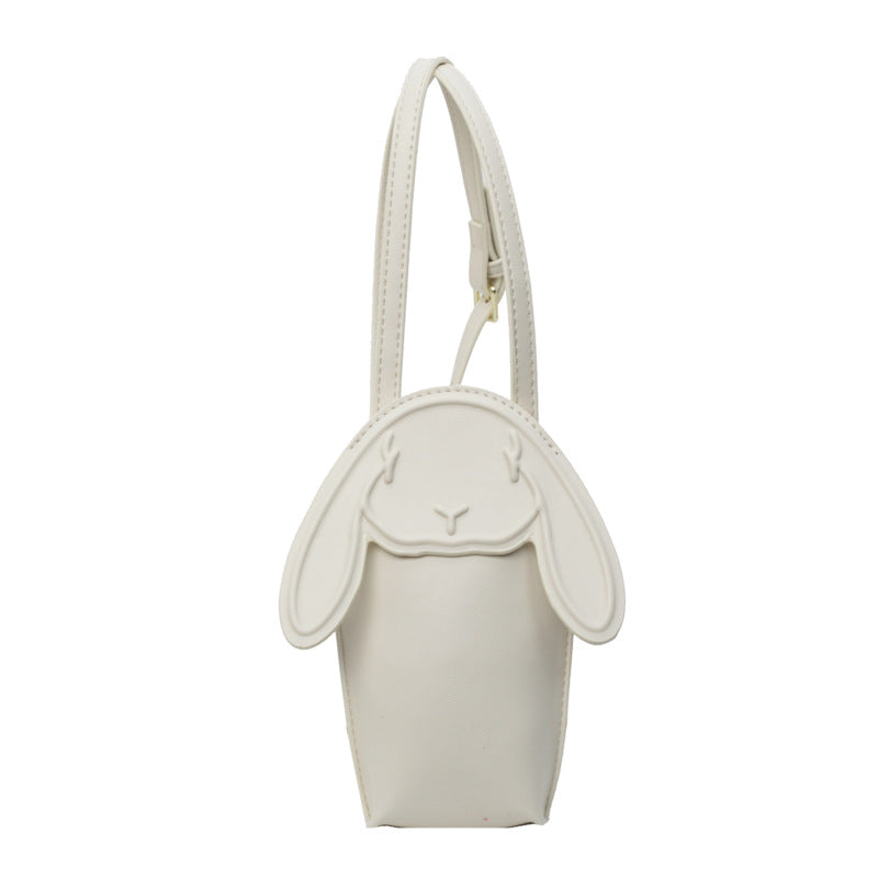 Cream faux leather bunny crossbody phone bag with floppy ears, front view