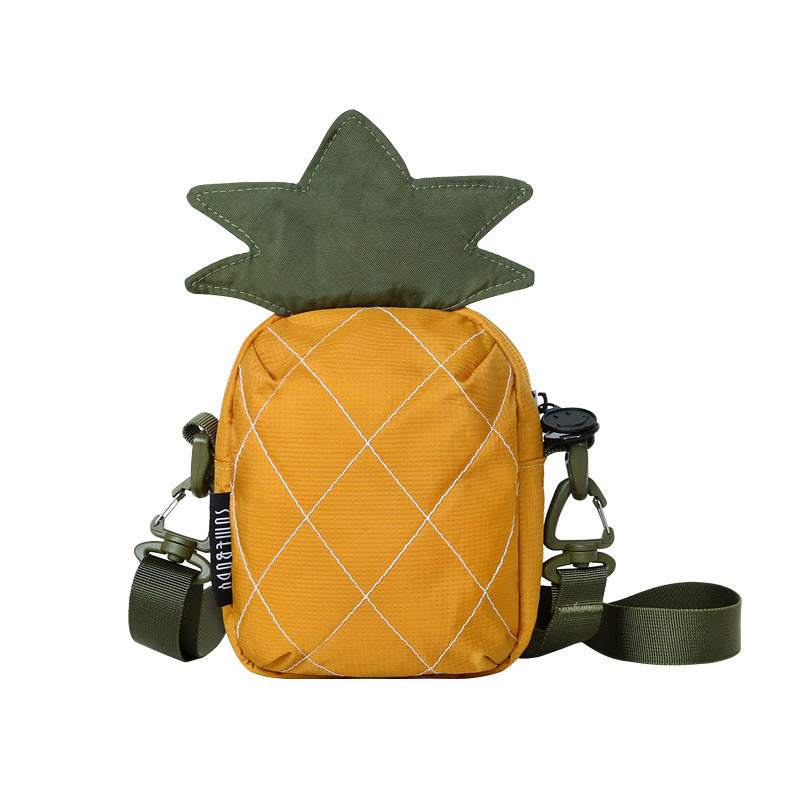 Mustard yellow quilted pineapple crossbody bag with olive leaf crown, front view