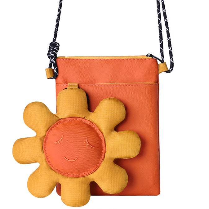 Orange phone bag with a puffy yellow sunflower, front view