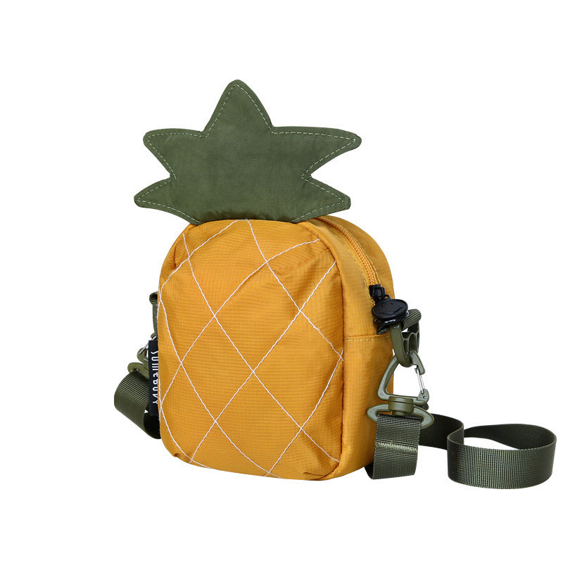 Pineapple crossbody bag, angled view showing the zip and depth