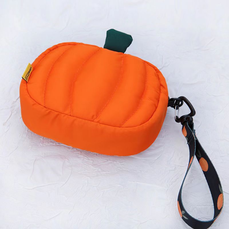 Close-up of the puffy pumpkin bag with green stem tab