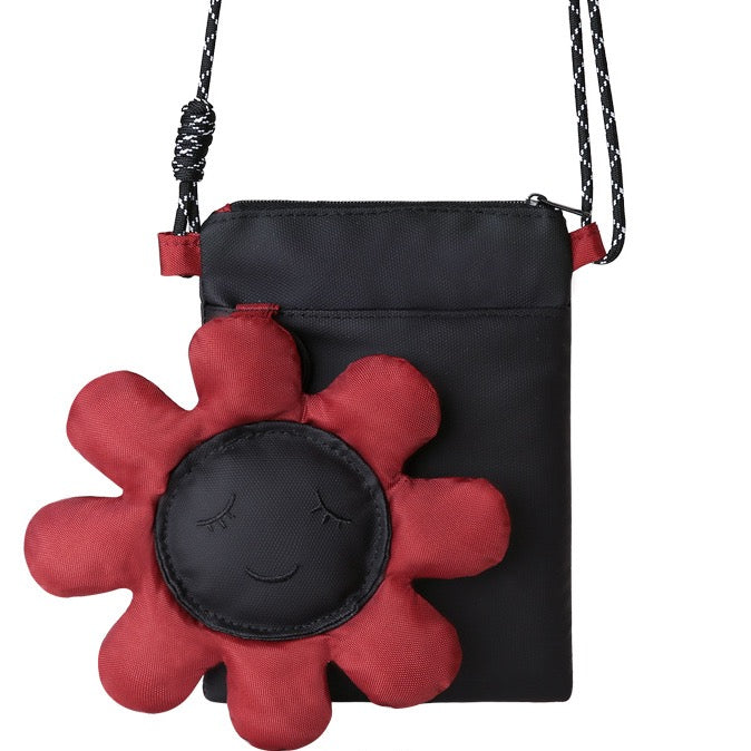 Black phone bag with a puffy red sunflower, front view