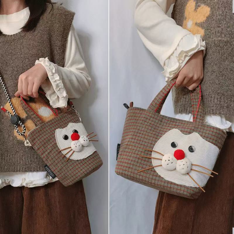 Mini crossbody worn and tote carried by hand