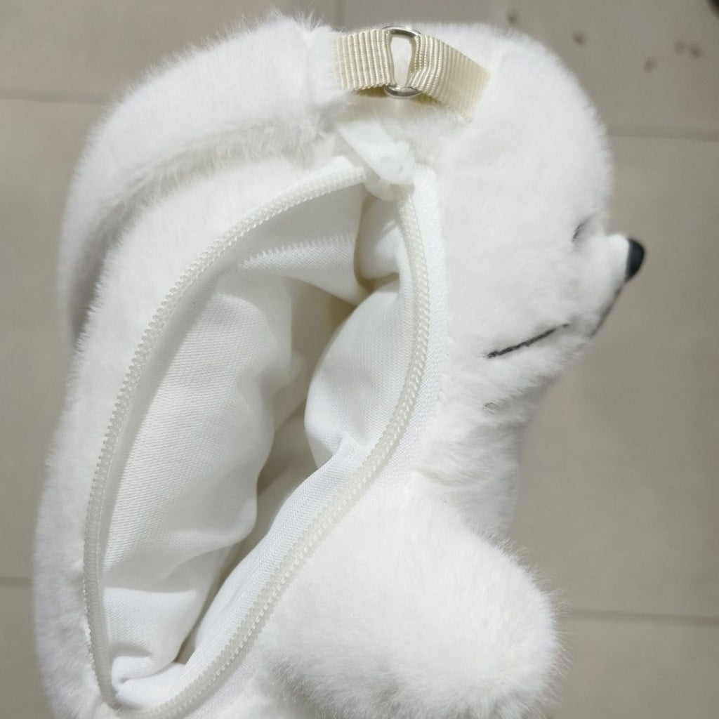 Back zip open showing the white lined compartment