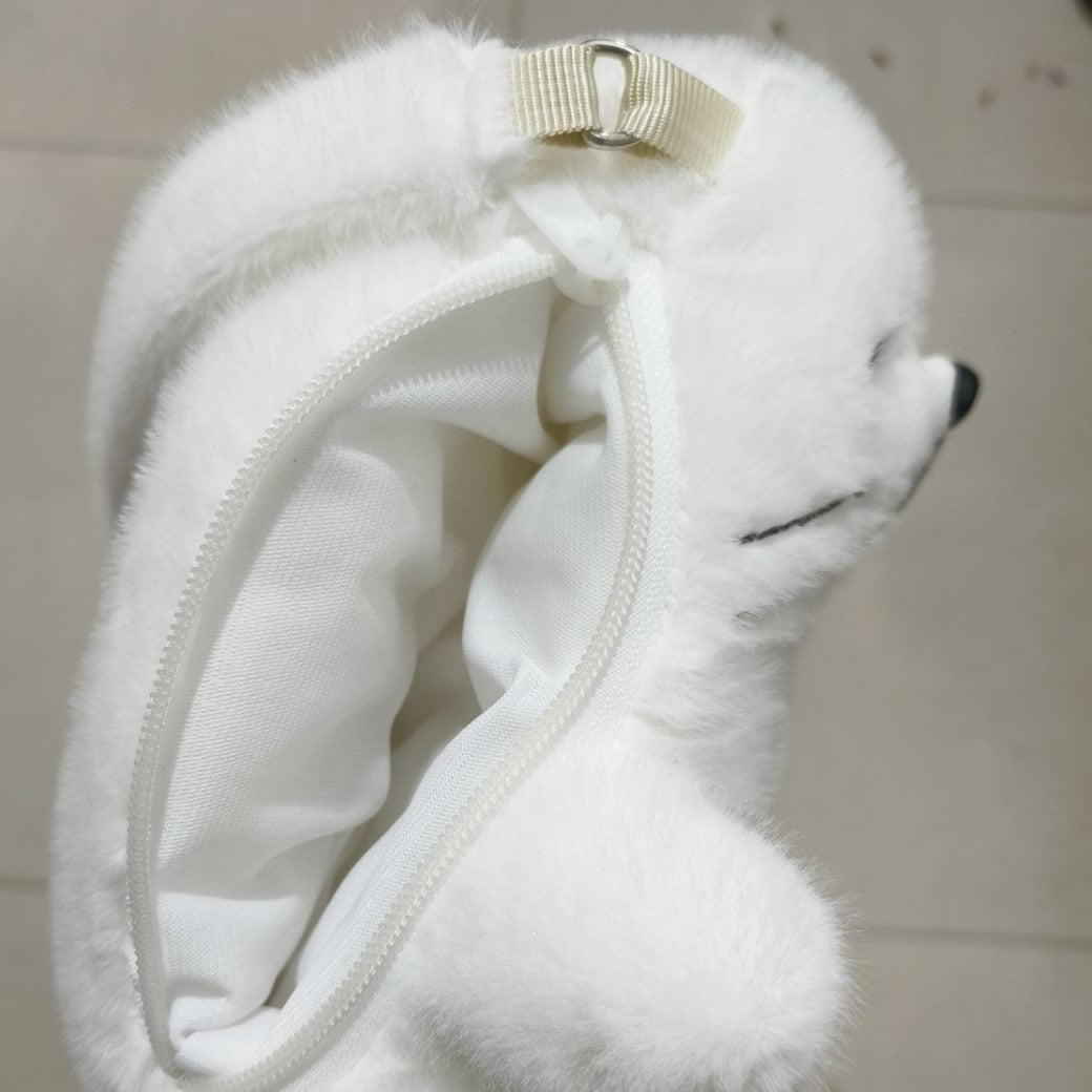 Back zip open showing the white lined compartment