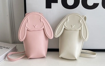 Pink and cream bunny bags side by side