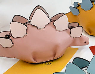Pink stegosaurus crossbody bag, side view