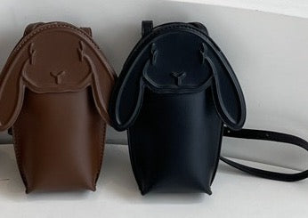 Chocolate brown and black bunny bags side by side